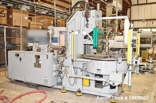 Used 80 Ton Newbury 4 Station Rotary Mold Machine, Model: 80VTCR5. Manufactured: 2000. Shot size: 5 ounce, platen size: 14" wide x 12" deep, stroke: 6.4" , daylight: 20.38" mold size: 14" x 12". Tabl...