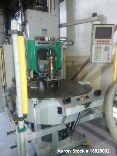 Used 80 Ton Newbury 4 Station Rotary Mold Machine, Model: 80VTCR5. Manufactured: 2000. Shot size: 5 ounce, platen size: 14" wide x 12" deep, stroke: 6.4" , daylight: 20.38" mold size: 14" x 12". Tabl...