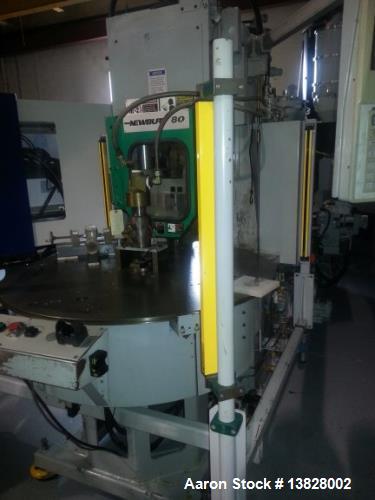 Used 80 Ton Newbury 4 Station Rotary Mold Machine, Model: 80VTCR5. Manufactured: 2000. Shot size: 5 ounce, platen size: 14" wide x 12" deep, stroke: 6.4" , daylight: 20.38" mold size: 14" x 12". Tabl...