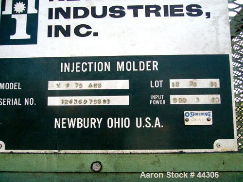 USED: Newbury 75 ton vertical injection molder. Has 9 ounce shotcapacity with vertical clamp including 12" x 12" tie bar clearnace.Includes operator control panel with temperature controls. ModelV9-7...