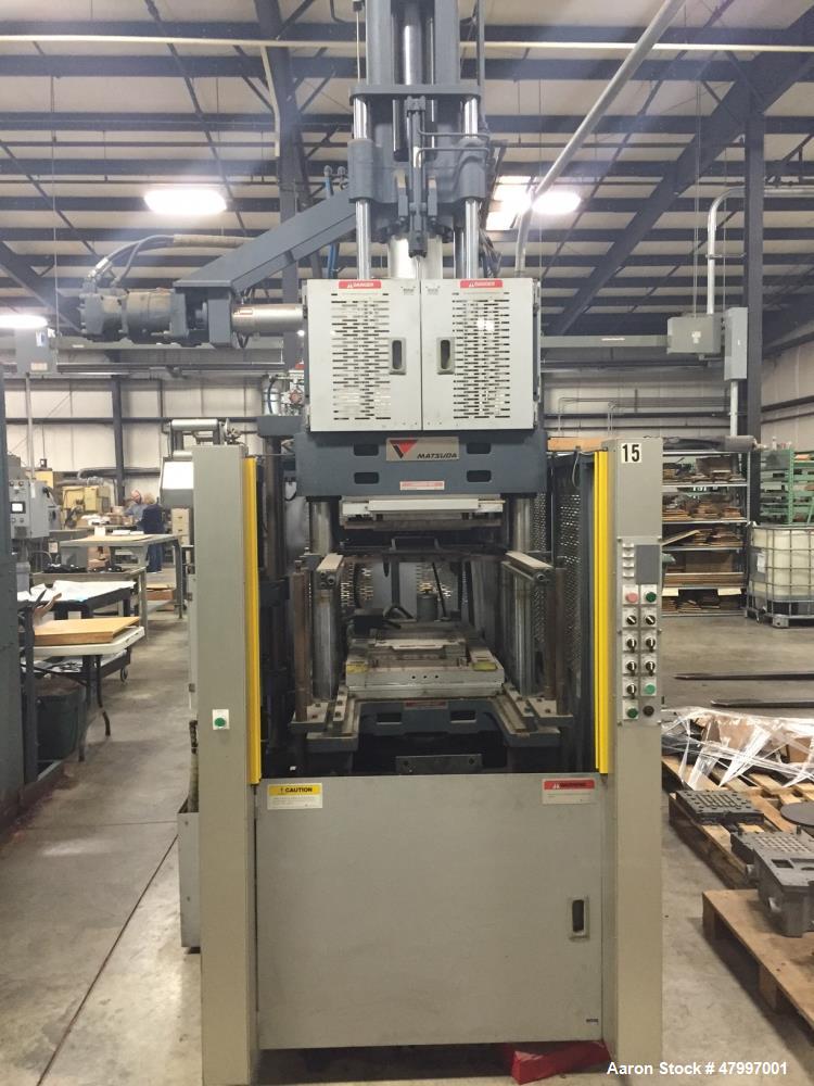 Used Matsuda Vertical Rubber Injection Molding Machine, Model VI-150P(SU)-40-60SPR5-P. 15" x 15", 150 Ton, 1476 KN clamping force. 43 KN mold opening force, 550 mm daylight, 375 mm stroke. 175 mm min...