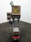 Used Morgan-Press Vertical Injection Molder, Model G100T. 20 Ton maximum clamping force, 0-800 degrees F temperature control range, 12,000 psi maximum injection pressure. 

