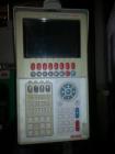 Used 80 Ton Newbury 4 Station Rotary Mold Machine, Model: 80VTCR5. Manufactured: 2000. Shot size: 5 ounce, platen size: 14