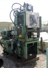 USED: Newbury 75 ton vertical injection molder. Has 9 ounce shotcapacity with vertical clamp including 12