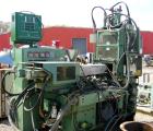 USED: Newbury 75 ton vertical injection molder. Has 9 ounce shotcapacity with vertical clamp including 12