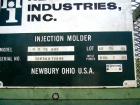 USED: Newbury 75 ton vertical injection molder. Has 9 ounce shotcapacity with vertical clamp including 12