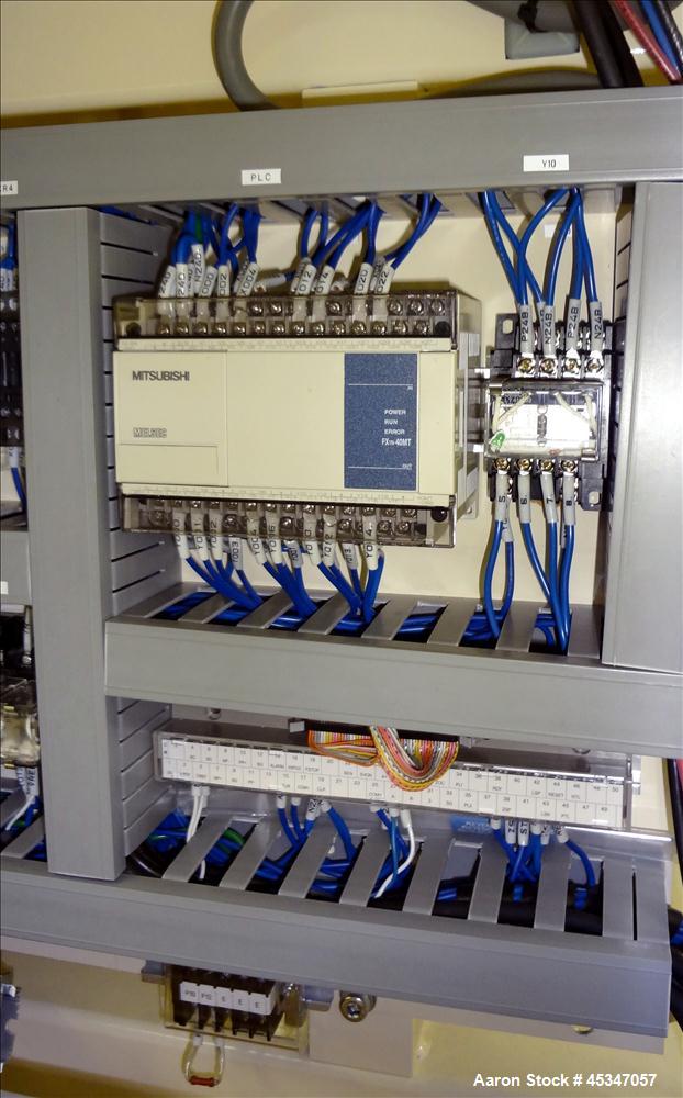 Used Yasui Seiki Vertical 2 Roll Calendar,