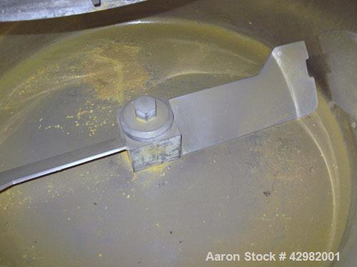 Used Henschel Cooler, Model KM-350, 12.4 cubic feet, stainless steel.  Jacketed bowl 39" diameter x 18" deep.  Single tier paddle style blade.  Full swing away top cover, pneumatic valve discharge.  ...