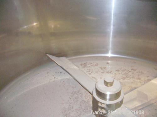 USED: 2130 liter Henschel model KM2200 cooler, new 2001. Has 2 tier blade design. Stainless steel bowl, jacketed. Includes swivel lid and air actuated discharge. Driven by approximately 50 hp, 575 vo...