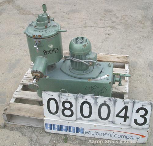Used Henschel High Intensity Lab Mixer, Model FM-10, 10 Liter (.35 cubic feet) Capacity, 316 Stainless Steel. Carbon steel jacketed bowl 9" diameter x 9" deep. Hinged top cover with baffle, 2 tier bl...