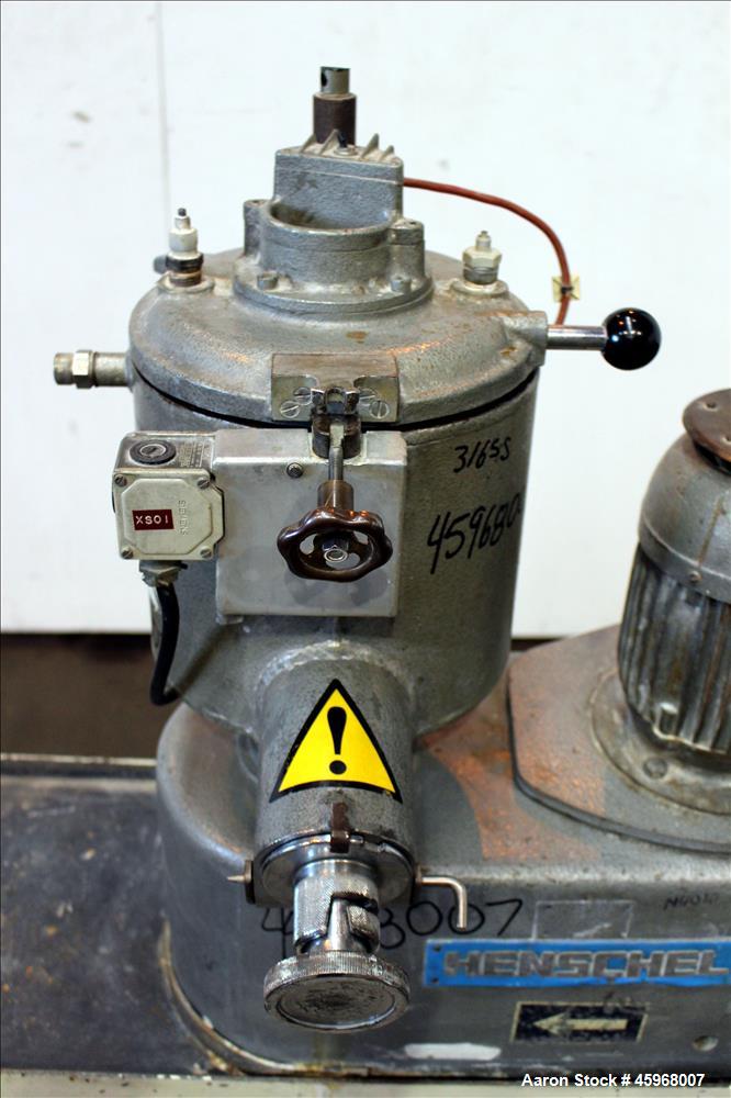 Used Henschel High Intensive Lab Mixer, Model FM 10L, 10 Liter (.35 cubic feet) Capacity, 316 Stainless Steel. Carbon steel jacketed bowl 9" diameter x 9" deep. Hinged top cover with baffle, 2 tier b...