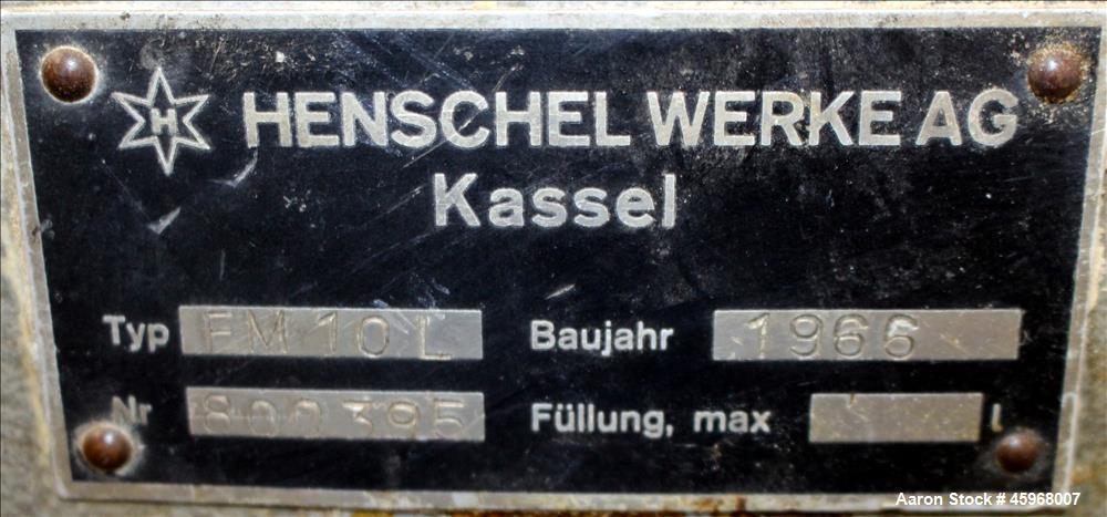 Used Henschel High Intensive Lab Mixer, Model FM 10L, 10 Liter (.35 cubic feet) Capacity, 316 Stainless Steel. Carbon steel jacketed bowl 9" diameter x 9" deep. Hinged top cover with baffle, 2 tier b...