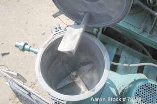 USED: Henschel high intensity lab mixer, model FM10, 10 liter, .34 cubic feet, 316 stainless steel. Carbon steel jacketed bowl 9" diameter x 9" deep. Hinged top cover with baffle, 2 tier blade. 2" di...