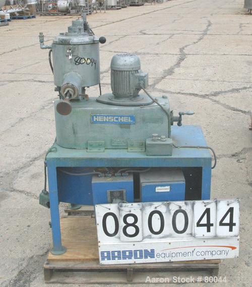 USED: Henschel high intensity lab mixer, model FM10L. 10 liter, .34 cubic feet, 316 stainless steel. Carbon steel jacketed bowl 9" diameter x 9" deep. Hinged top cover with baffle, 2 tier blade. Side...
