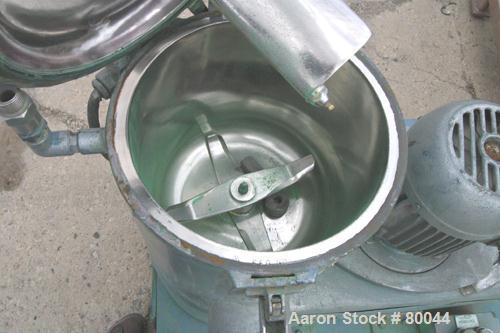 USED: Henschel high intensity lab mixer, model FM10L. 10 liter, .34 cubic feet, 316 stainless steel. Carbon steel jacketed bowl 9" diameter x 9" deep. Hinged top cover with baffle, 2 tier blade. Side...