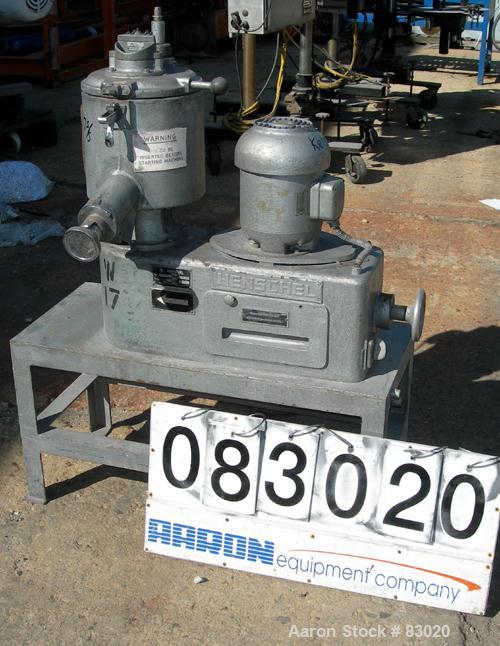 USED: Henschel high intensity lab mixer, model FM10, 10 liter (.34 cubic foot), 317 stainless steel. Carbon steel jacketed bowl 9" diameter x 9" deep. Hinged top cover with baffle, 2 tier blade. Side...