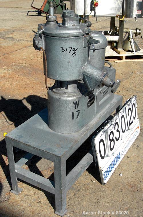USED: Henschel high intensity lab mixer, model FM10, 10 liter (.34 cubic foot), 317 stainless steel. Carbon steel jacketed bowl 9" diameter x 9" deep. Hinged top cover with baffle, 2 tier blade. Side...