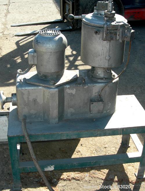USED: Henschel high intensity lab mixer, model FM10, 10 liter (.34 cubic foot), 317 stainless steel. Carbon steel jacketed bowl 9" diameter x 9" deep. Hinged top cover with baffle, 2 tier blade. Side...