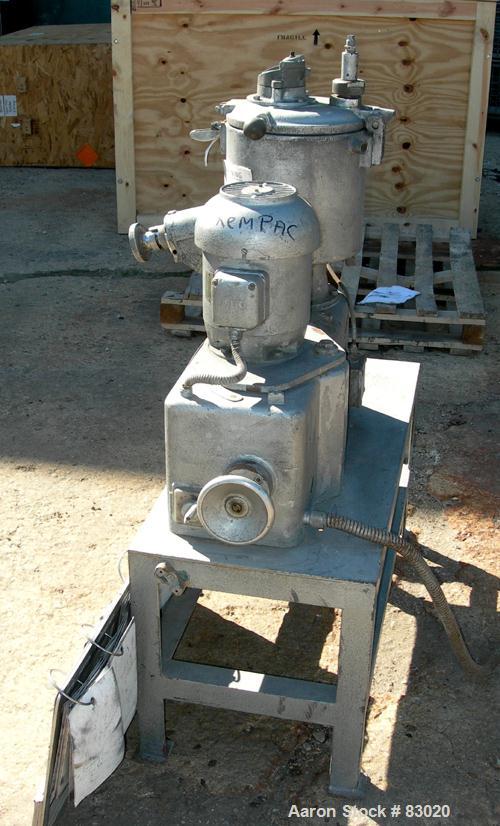 USED: Henschel high intensity lab mixer, model FM10, 10 liter (.34 cubic foot), 317 stainless steel. Carbon steel jacketed bowl 9" diameter x 9" deep. Hinged top cover with baffle, 2 tier blade. Side...