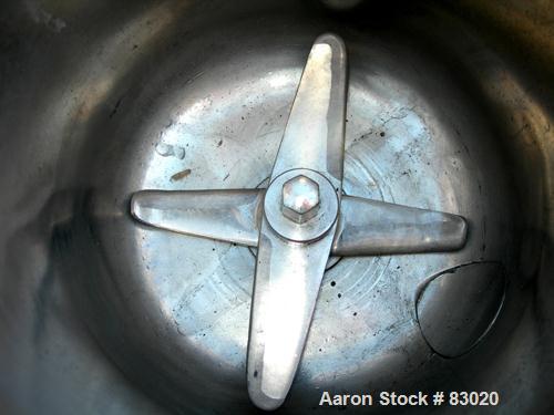 USED: Henschel high intensity lab mixer, model FM10, 10 liter (.34 cubic foot), 317 stainless steel. Carbon steel jacketed bowl 9" diameter x 9" deep. Hinged top cover with baffle, 2 tier blade. Side...