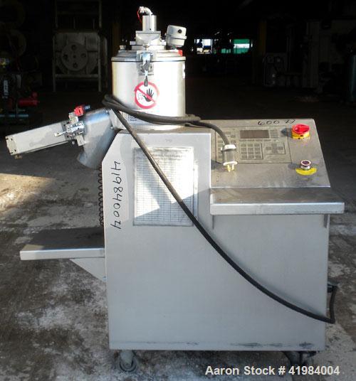 Used Henschel High Intensity Lab Mixer, model FM-10, 10 liter (.35 cubic feet) capacity, 316 stainless steel. Carbon steel jacketed bowl 9" diameter x 9" deep. Hinged top cover with baffle, 2 tier bl...