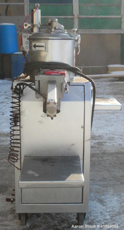 Used Henschel High Intensity Lab Mixer, model FM-10, 10 liter (.35 cubic feet) capacity, 316 stainless steel. Carbon steel jacketed bowl 9" diameter x 9" deep. Hinged top cover with baffle, 2 tier bl...