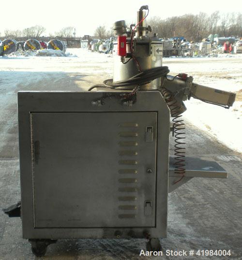 Used Henschel High Intensity Lab Mixer, model FM-10, 10 liter (.35 cubic feet) capacity, 316 stainless steel. Carbon steel jacketed bowl 9" diameter x 9" deep. Hinged top cover with baffle, 2 tier bl...