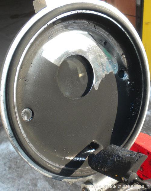 Used Henschel High Intensity Lab Mixer, model FM-10, 10 liter (.35 cubic feet) capacity, 316 stainless steel. Carbon steel jacketed bowl 9" diameter x 9" deep. Hinged top cover with baffle, 2 tier bl...