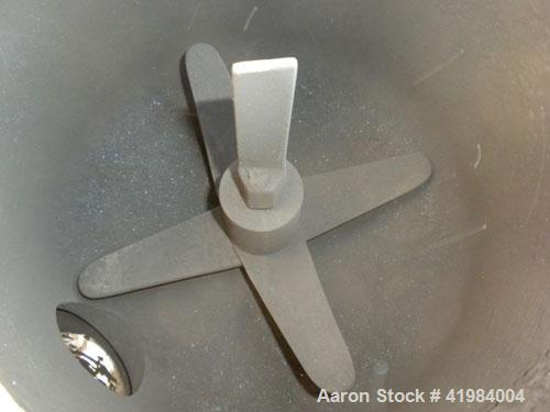 Used Henschel High Intensity Lab Mixer, model FM-10, 10 liter (.35 cubic feet) capacity, 316 stainless steel. Carbon steel jacketed bowl 9" diameter x 9" deep. Hinged top cover with baffle, 2 tier bl...