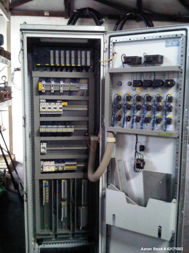 Used Mixaco High Intensive Mixer, Type CM 1000.  Stainless steel on product contact parts, (1) interchangeable bowl on wheels, total capacity 35 cubic feet (1000 liters), working capacity 23.5 cubic ...