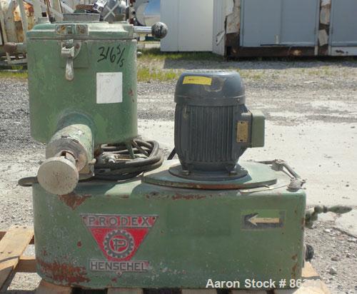 Used Prodex Henschel High Intensity Lab Mixer, Approximately 10 Liter (.34 Cubic Feet), 316 Stainless Steel. Carbon steel jacketed bowl 9" diameter x 9" deep. Hinged top cover with baffle, 2 tier bla...