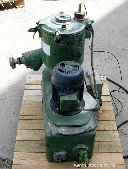 Used Prodex Henschel High Intensity Lab Mixer, Approximately 10 Liter (.34 Cubic Feet), 316 Stainless Steel. Carbon steel jacketed bowl 9" diameter x 9" deep. Hinged top cover with baffle, 2 tier bla...