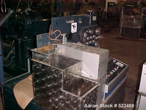 USED: Betol Betopac tubing/straw line consisting of the following: 50mm Betol model 5025, 24:1 L/D, non-vented extruder with electrically heated, air cooled barrel. Has 14 kw DC motor. Includes gearb...
