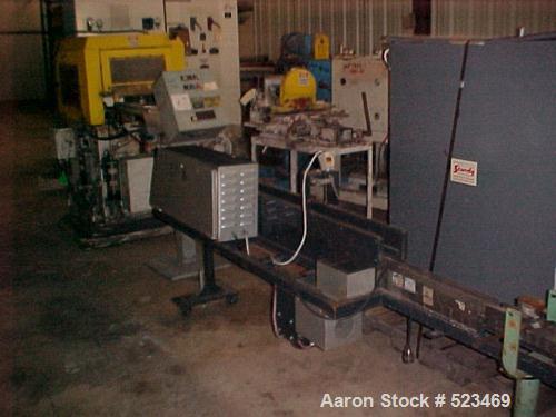 USED: Betol Betopac tubing/straw line consisting of the following: 50mm Betol model 5025, 24:1 L/D, non-vented extruder with electrically heated, air cooled barrel. Has 14 kw DC motor. Includes gearb...