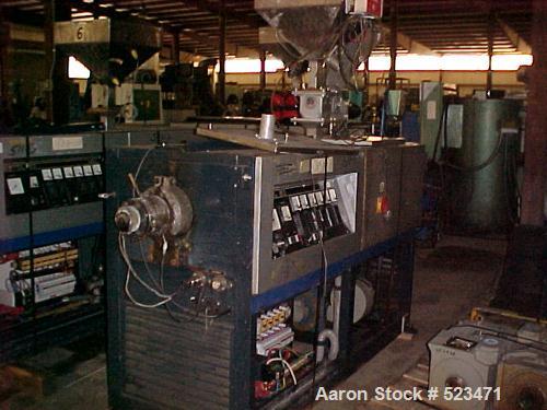 USED: Betol tubing/straw line, new 1989. Line consists of the following: Betol model 5025 50mm extruder. Extruder is belt driven from 14 kw DC motor controlled to torque arm reducer. Extruder is elec...