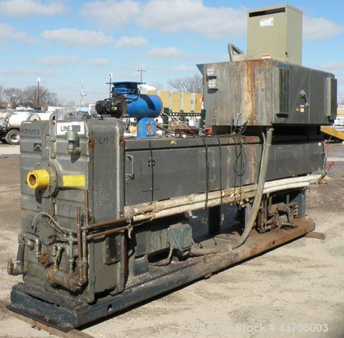 Used McNeil / NRM Profile Extrusion Line consisting of: (1) McNeil/NRM 4-1/2" single screw extruder, model 4.5 Pacemaker III32-1 RH/WC, 32 to 1 L/D ratio, electrically heated, water cooled non-vented...
