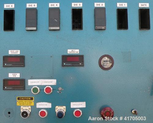 Used McNeil / NRM Profile Extrusion Line consisting of: (1) McNeil/NRM 4-1/2" single screw extruder, model 4.5 Pacemaker III32-1 RH/WC, 32 to 1 L/D ratio, electrically heated, water cooled non-vented...