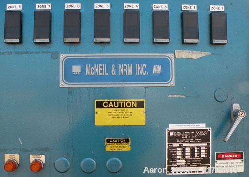 Used McNeil / NRM Profile Extrusion Line consisting of: (1) McNeil/NRM 4-1/2" single screw extruder, model 4.5 Pacemaker III32-1 RH/WC, 32 to 1 L/D ratio, electrically heated, water cooled non-vented...