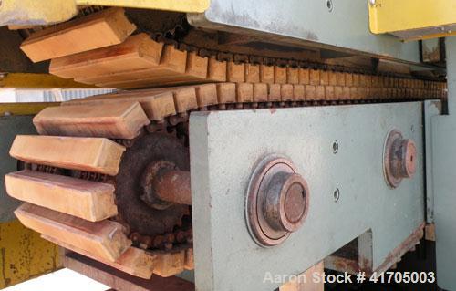 Used McNeil / NRM Profile Extrusion Line consisting of: (1) McNeil/NRM 4-1/2" single screw extruder, model 4.5 Pacemaker III32-1 RH/WC, 32 to 1 L/D ratio, electrically heated, water cooled non-vented...