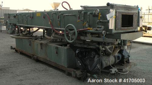Used McNeil / NRM Profile Extrusion Line consisting of: (1) McNeil/NRM 4-1/2" single screw extruder, model 4.5 Pacemaker III32-1 RH/WC, 32 to 1 L/D ratio, electrically heated, water cooled non-vented...