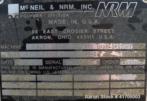 Used McNeil / NRM Profile Extrusion Line consisting of: (1) McNeil/NRM 4-1/2" single screw extruder, model 4.5 Pacemaker III32-1 RH/WC, 32 to 1 L/D ratio, electrically heated, water cooled non-vented...