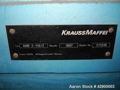 Used Krauss Maffei 110mm counter rotating twin screw extruder, model KMD-2-110Z, 110 mm screws, counter rotating, 25:1 l/d, electrically heated with 9 barrel zones, 17 die zones, 75 hp dc motor with ...