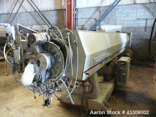 Used PTI 4.5" Trident Series Extruder, Model 4500, 48 to 1 L/D ratio. (7) Zone, electrically heated, water cooled, closed loop, non-vented barrel. Previously used for PE foam extrusion. Flender gearb...
