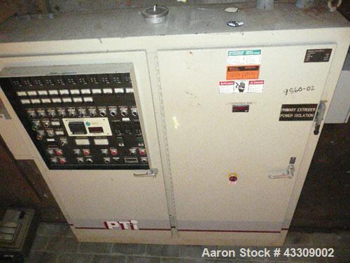 Used PTI 4.5" Trident Series Extruder, Model 4500, 48 to 1 L/D ratio. (7) Zone, electrically heated, water cooled, closed loop, non-vented barrel. Previously used for PE foam extrusion. Flender gearb...