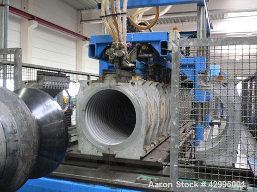 Used Unicor UC 1000/9 iV Corrugator Extrusion Line, for corrugated PE double wall pipes up to maximum 39.37" (1000 mm) outer dimension pipes, 230/400 volt, 50 hz. Comprised of: (10) Mann+Hummel mater...