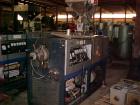 USED: Betol tubing/straw line, new 1989. Line consists of the following: Betol model 5025 50mm extruder. Extruder is belt driven from 14 kw DC motor controlled to torque arm reducer. Extruder is elec...