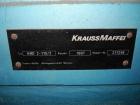 Used Krauss Maffei 110mm counter rotating twin screw extruder, model KMD-2-110Z, 110 mm screws, counter rotating, 25:1 l/d, electrically heated with 9 barrel zones, 17 die zones, 75 hp dc motor with ...