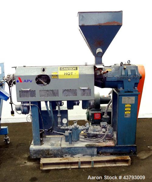 Used APV Single Screw Pelletizing Line Consisting Of: (1) APV 1-1/2” single screw extruder, 30 to 1 L/D ratio. Electrically heated, air cooled 4 zone, side vented barrel with vacuum pump. Water coole...