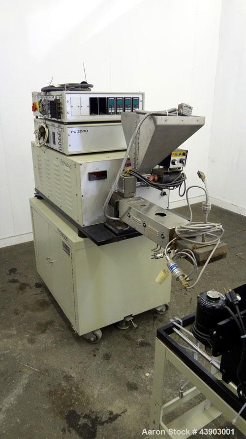 Used C.W. Brabender Plasti-Corder Extruder System consisting of: (1) Direct current drive unit, model DR-2071, type Polysped, No. 0105/PE, serial #265. Approximately 7 hp motor. (1) PL-2000 panel. (1...