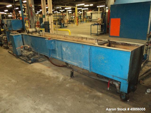 Used 6" Deltaplast extruder, 32 to 1 L/D ratio. Electrically heated, water cooled, jacketed feed section, thru Hamilton gearbox with 17.75 to 1 gearbox ratio, 300 hp DC motor with SCR controller, mai...